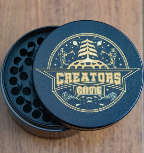 black grinder with gold lacrosse logo
